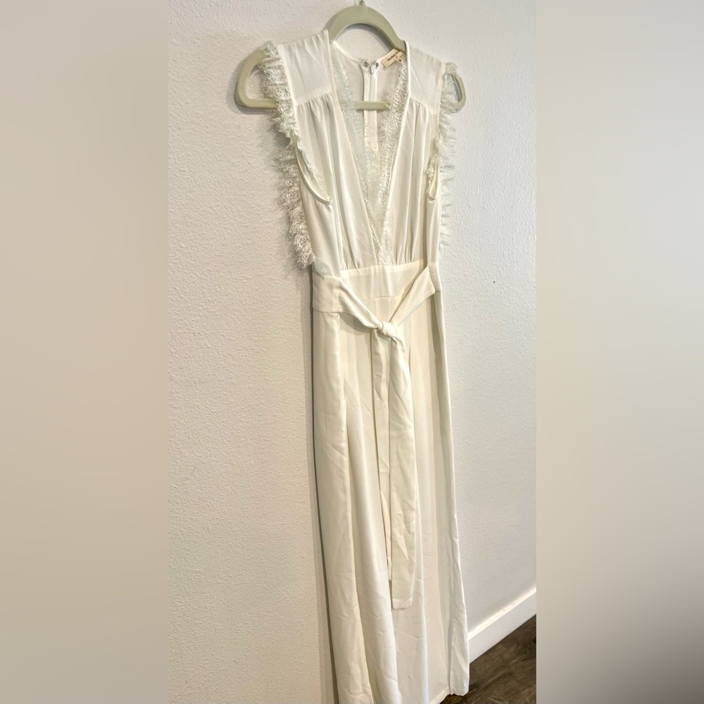 White delicate jumpsuit with lace detail